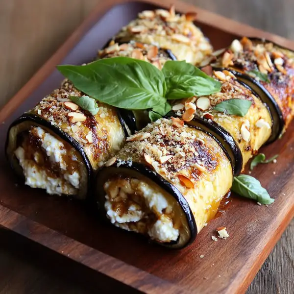 Rollitos de Berenjena con Ricotta, Orégano y Almendras Tostadas