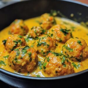 Bolitas de zanahoria y garbanzos en salsa de coco y curry